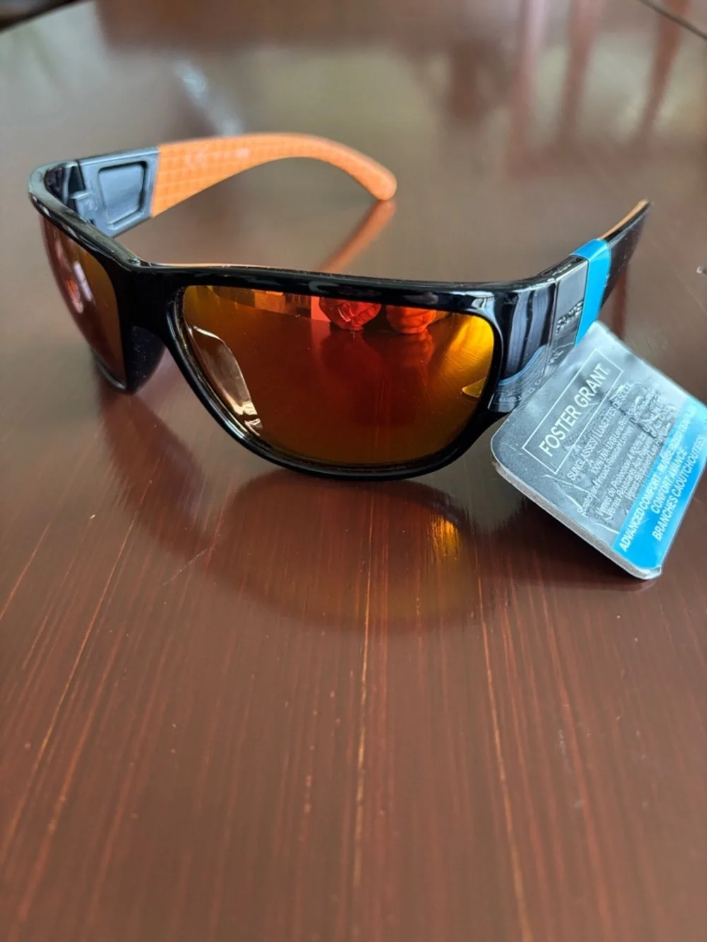 Foster Grant 100% UVA-UVB protect,black frame,rainbow mirror lens, rubber temple